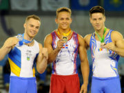 Los medallistas en Mundial de gimnasia Muntean, Audrys Nin Reyes y Viernaiev. Danilo Medina felicita al dominicano por el oro obtenido.
