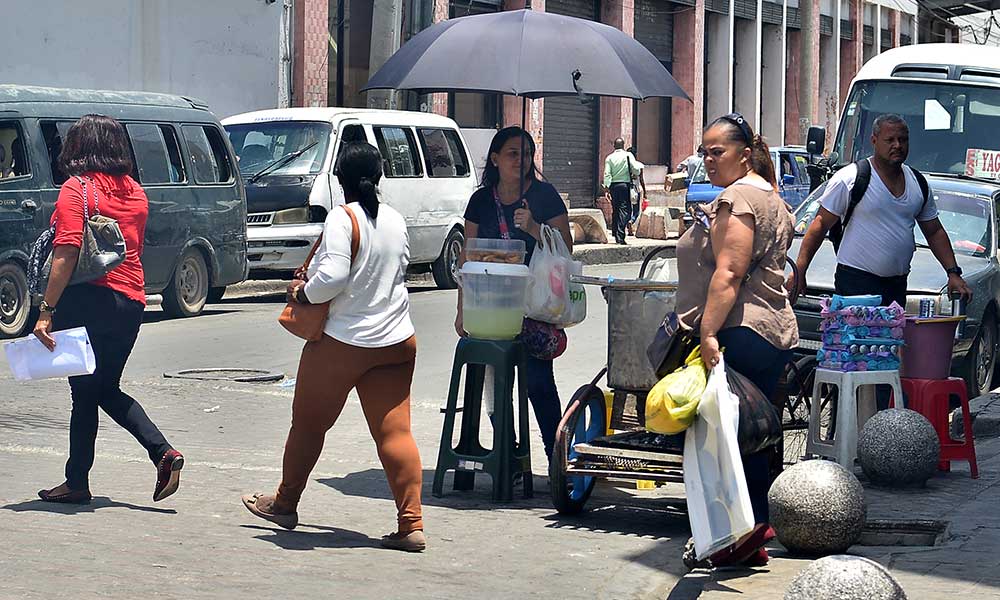 Derechos Humanos presenta informe. Muchos venezolanos han tenido que recurrir a la economía informal para subsistir y poder ayudar a sus familias. Foto Kelvin Mota