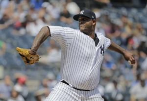 El abridor CC Sabathia lanza por los Yanquis de Nueva York en duelo con los Rangers de Texas, el domingo 12 de agosto de 2018, en Nueva York. (AP Foto/Seth Wenig)